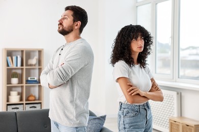 Photo of Couple having quarrel at home. Relationship problems