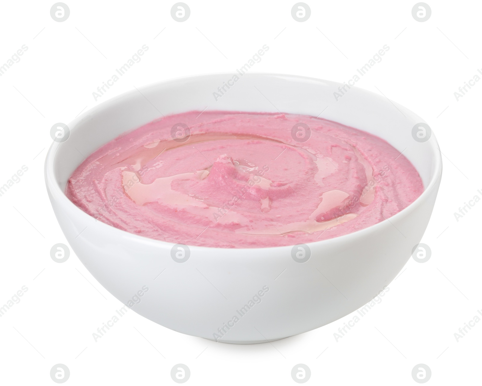 Photo of Tasty beetroot hummus in bowl isolated on white