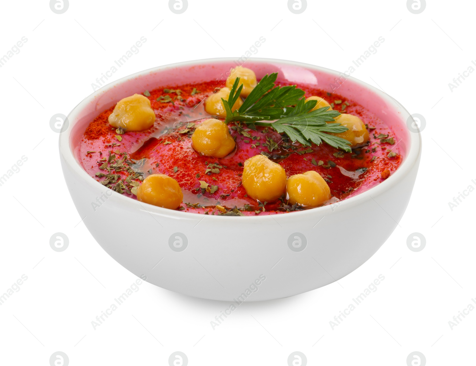 Photo of Tasty beetroot hummus and chickpeas in bowl isolated on white