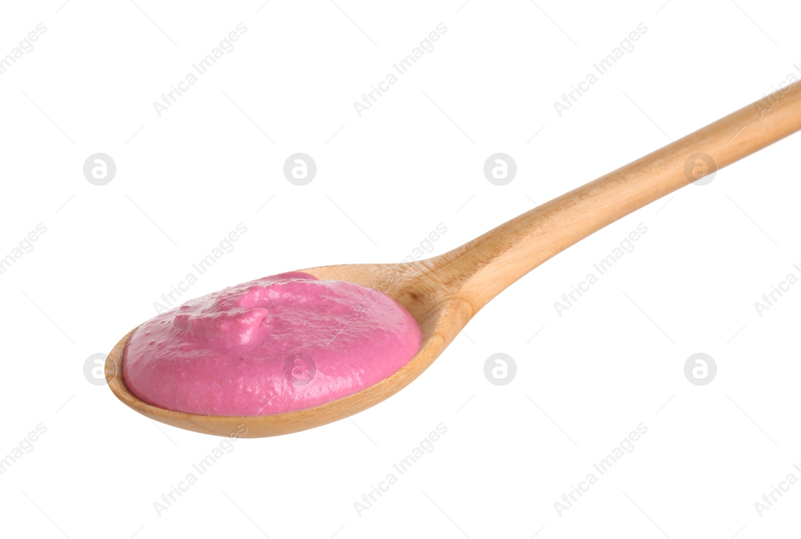 Photo of Tasty beetroot hummus in wooden spoon isolated on white