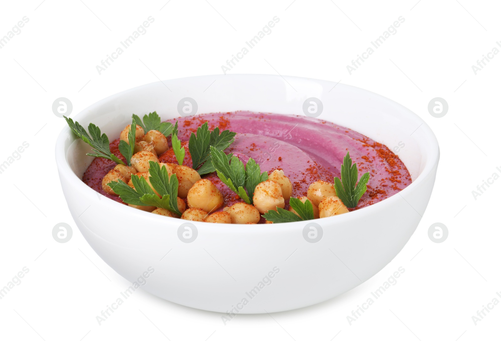 Photo of Tasty beetroot hummus and chickpeas in bowl isolated on white