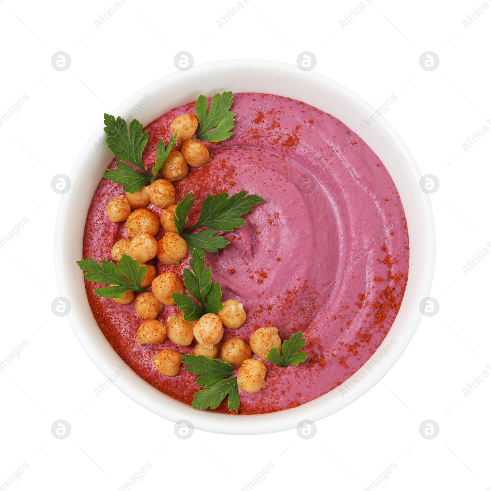 Photo of Tasty beetroot hummus and chickpeas in bowl isolated on white, top view