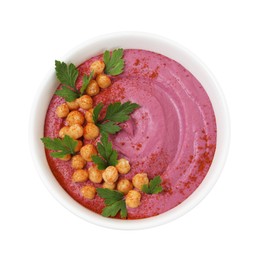 Photo of Tasty beetroot hummus and chickpeas in bowl isolated on white, top view