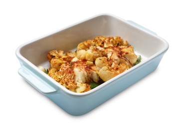 Photo of Delicious baked cauliflower steaks with garlic and parsley in baking dish isolated on white