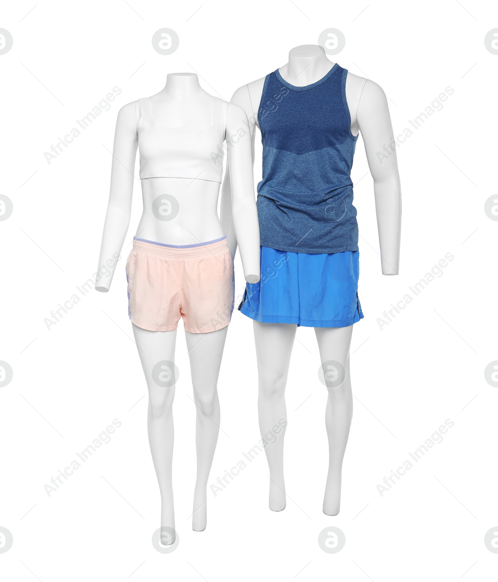 Photo of Female and male mannequins with stylish sportswear isolated on white