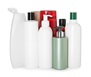 Photo of Many different bottles of shampoo isolated on white