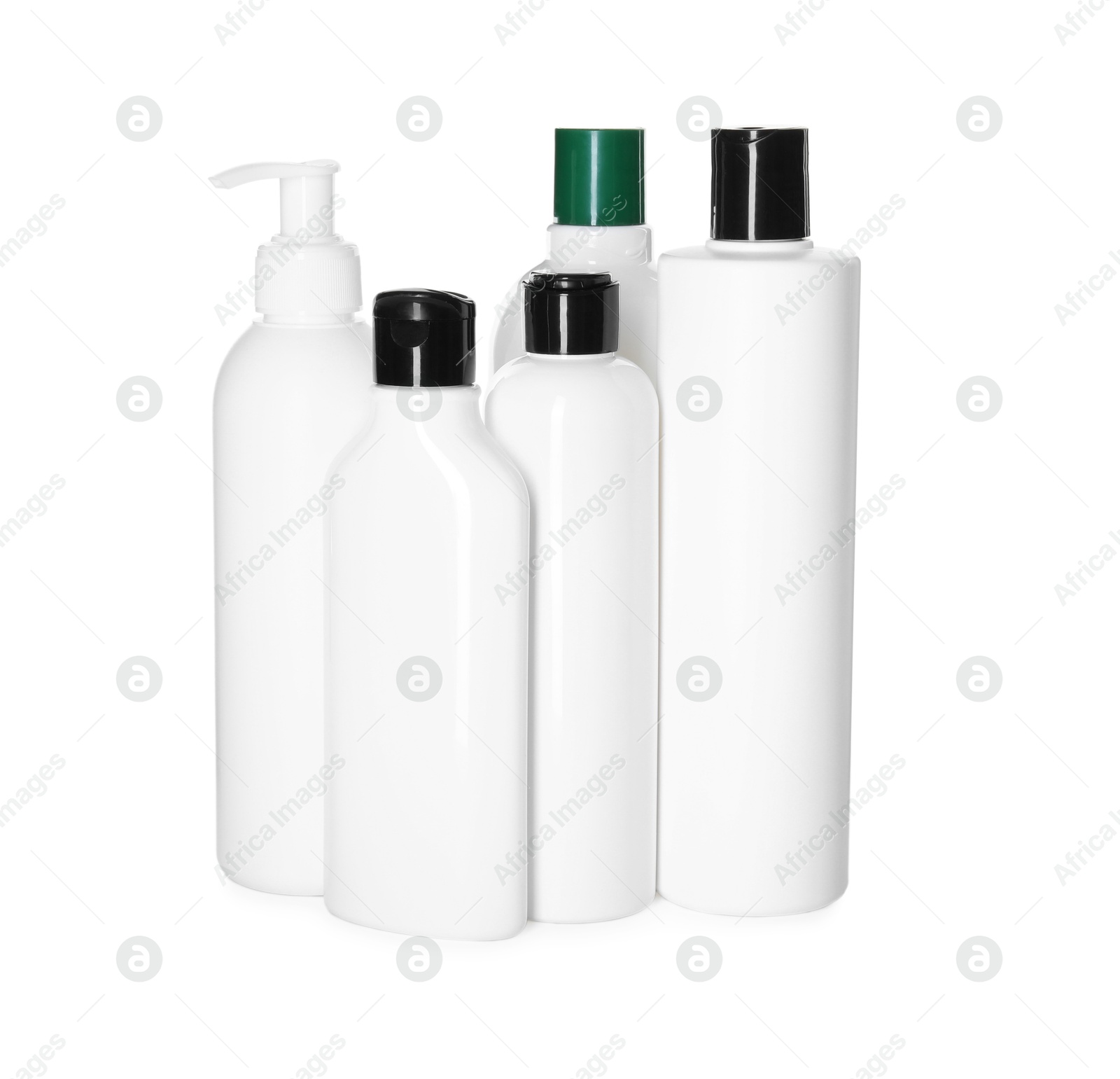 Photo of Bottles of shampoo isolated on white. Personal care product