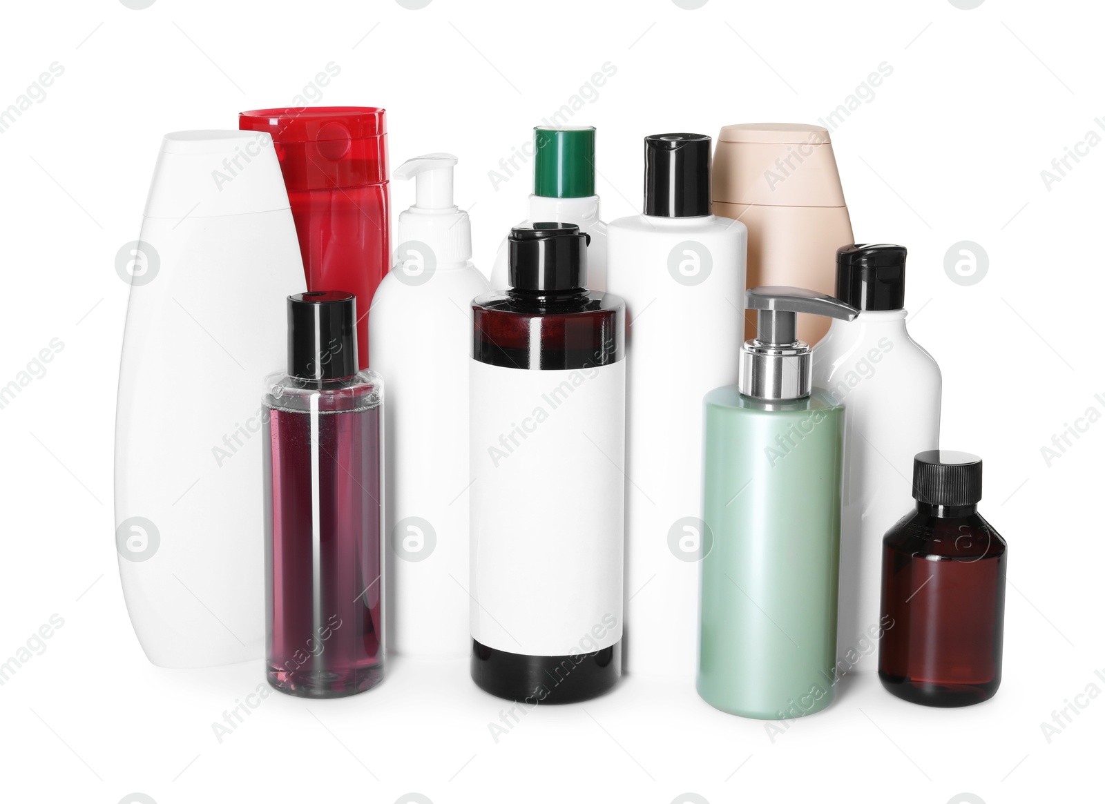 Photo of Bottles of shampoo isolated on white. Personal care product