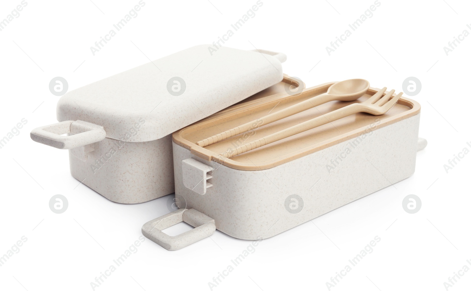 Photo of Compartments of plastic lunch box with cutlery isolated on white