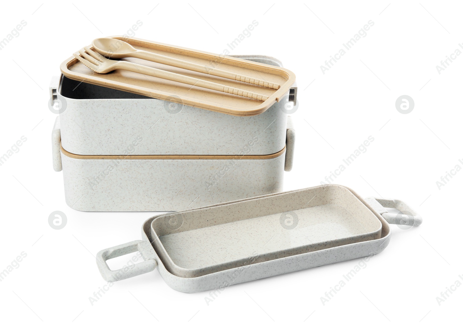 Photo of Compartments of plastic lunch box with cutlery isolated on white