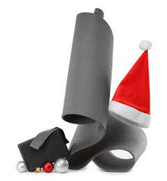 Photo of Yoga mat, block, Santa hat and baubles isolated on white