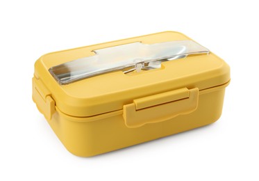 Photo of Yellow lunch box with cutlery isolated on white