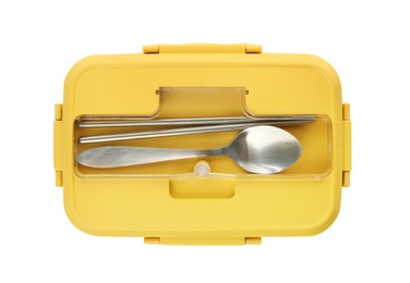 Photo of Yellow lunch box with cutlery isolated on white, top view