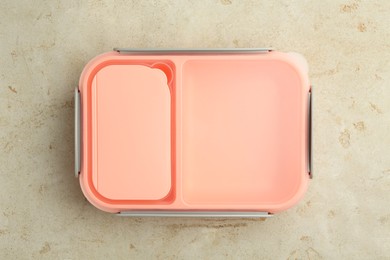 Photo of One plastic lunch box on grey table, top view