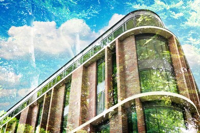 Image of Environment preservation. Double exposure of modern building and trees, low angle view