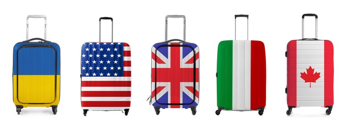 Image of Suitcases painted in national flags of different countries isolated on white, set