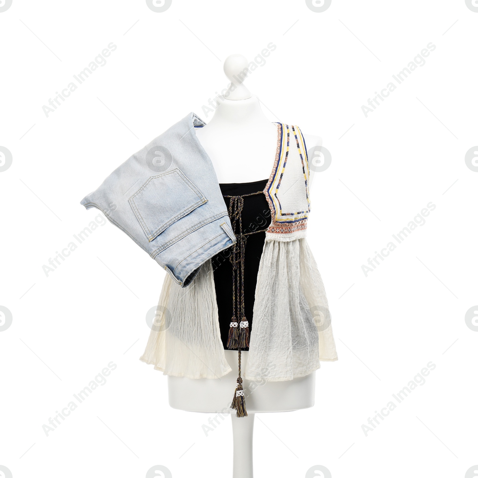 Photo of Mannequin with new stylish shirt and denim shorts isolated on white