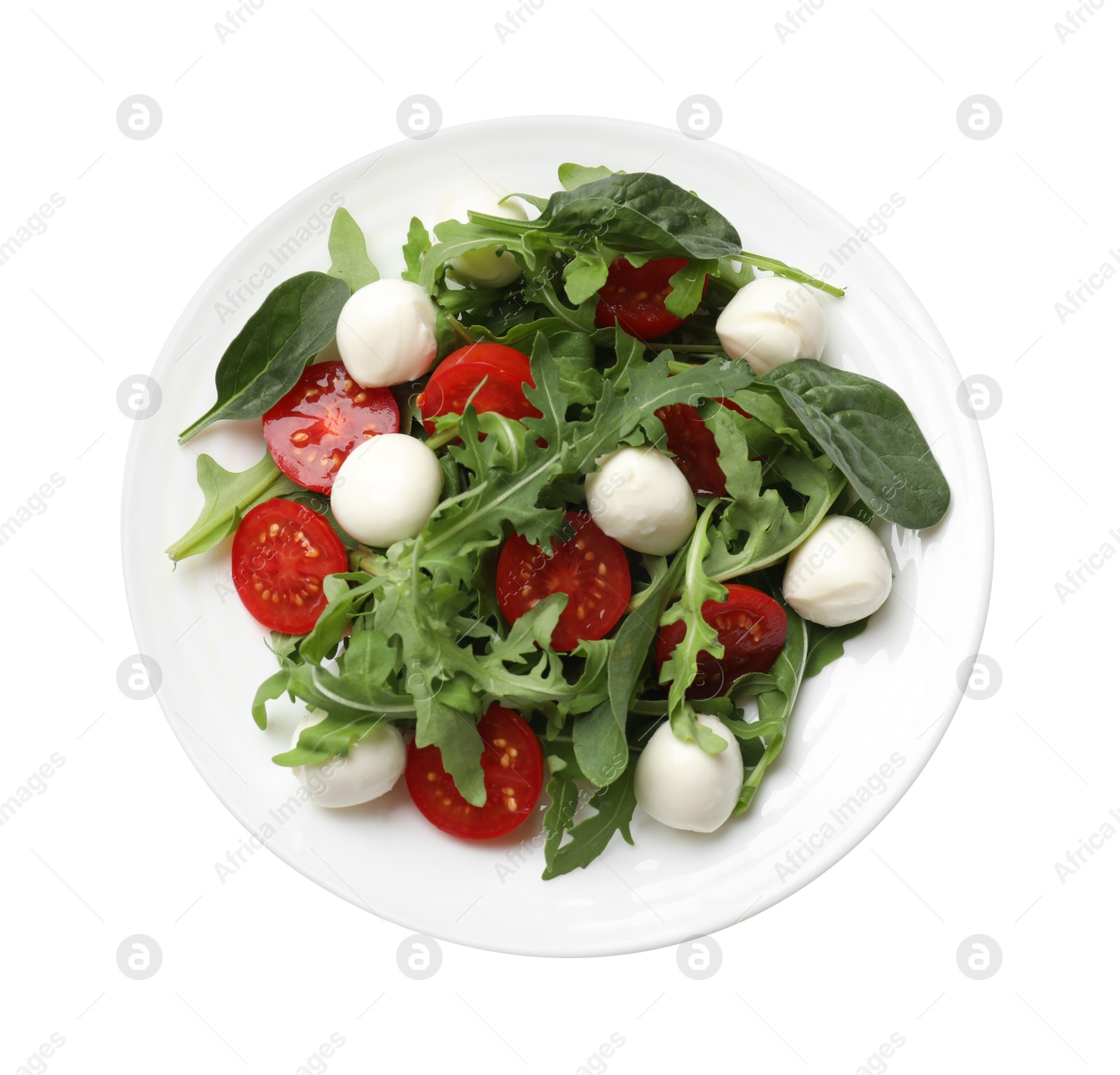 Photo of Tasty salad with arugula, spinach, mozzarella cheese and tomatoes isolated on white, top view