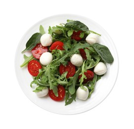 Photo of Tasty salad with arugula, spinach, mozzarella cheese and tomatoes isolated on white, top view