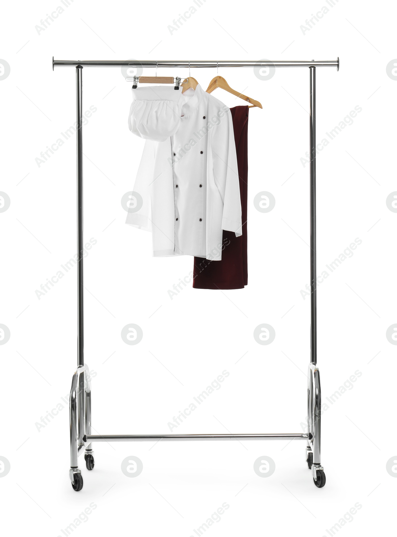 Photo of Chef's uniform on clothing rack against white background