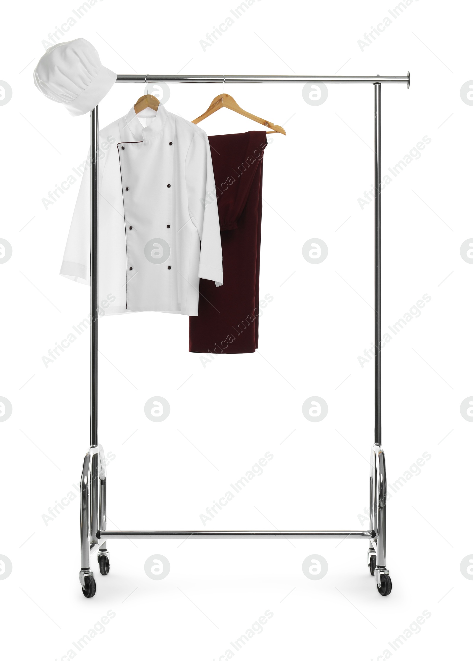 Photo of Chef's uniform on clothing rack against white background