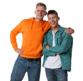 Two happy brothers posing on white background