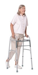 Photo of Senior woman using walking frame on white background