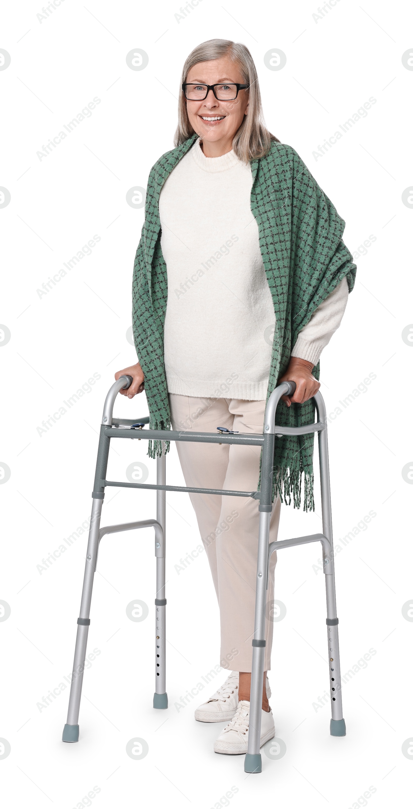 Photo of Senior woman using walking frame on white background