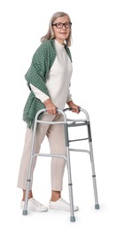 Photo of Senior woman using walking frame on white background