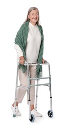 Senior woman using walking frame on white background