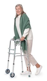 Senior woman using walking frame on white background