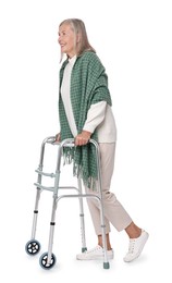 Photo of Senior woman using walking frame on white background