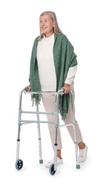 Photo of Senior woman using walking frame on white background