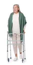 Photo of Senior woman using walking frame on white background