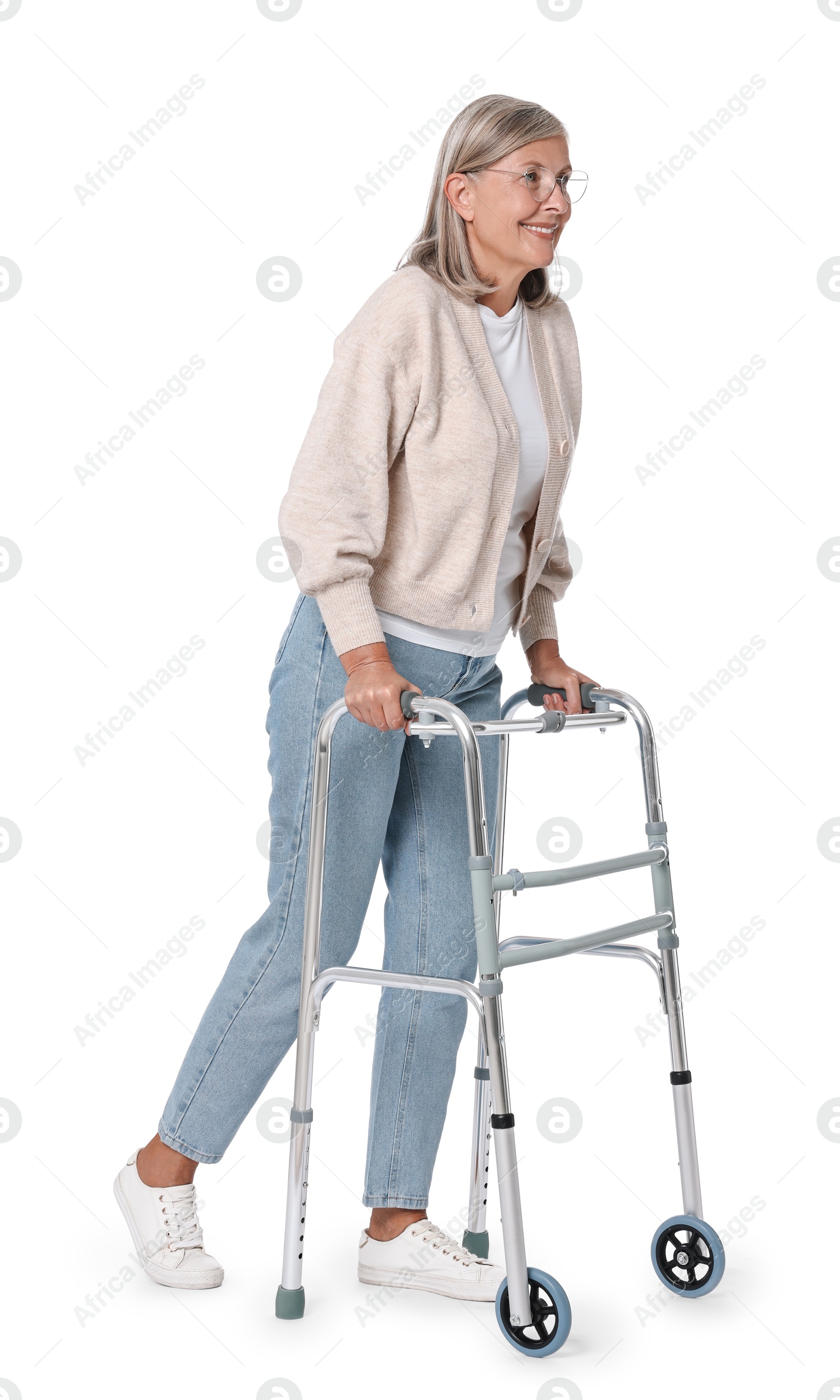 Photo of Senior woman using walking frame on white background