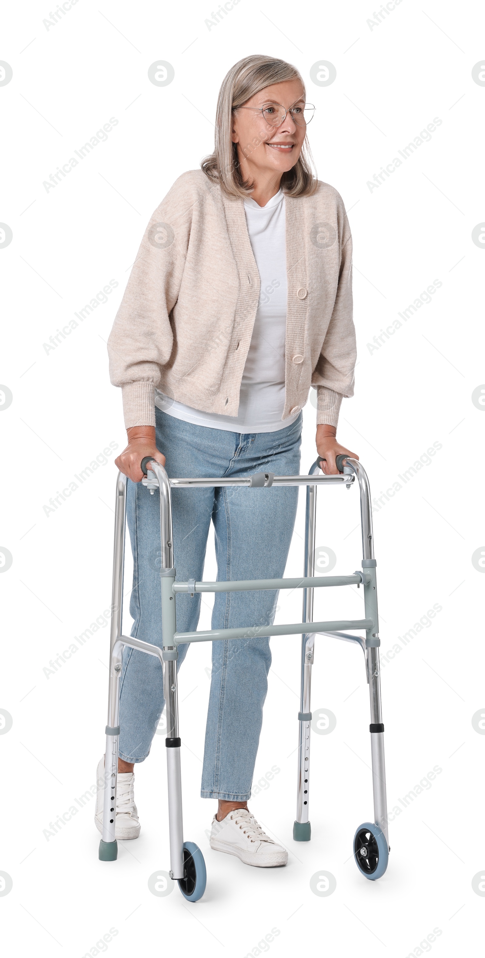 Photo of Senior woman using walking frame on white background