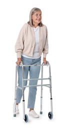 Senior woman using walking frame on white background