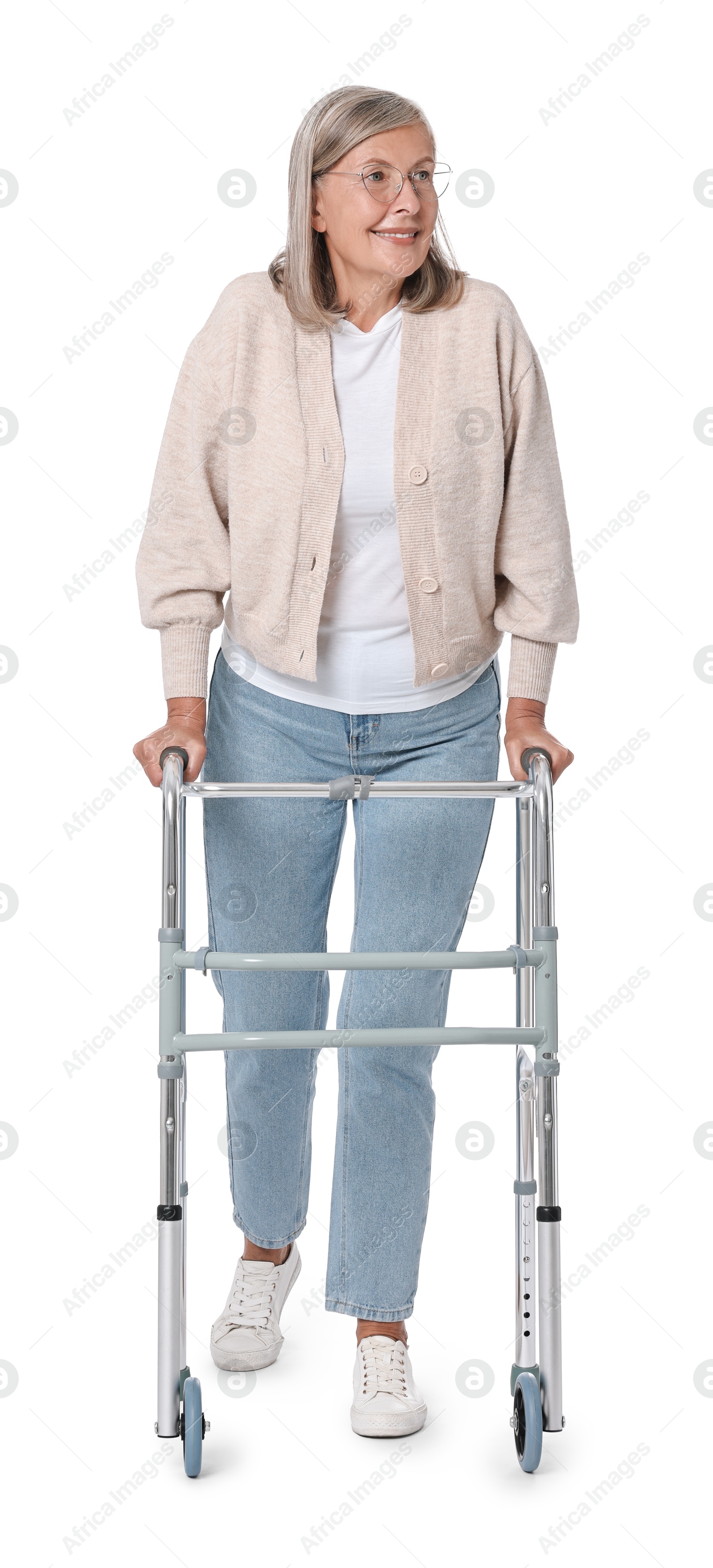 Photo of Senior woman using walking frame on white background