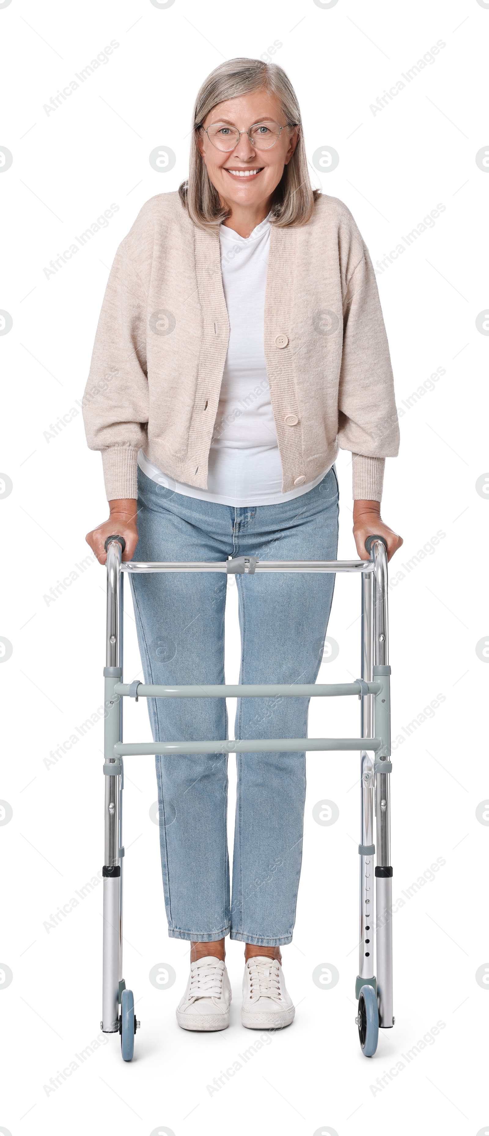 Photo of Senior woman using walking frame on white background