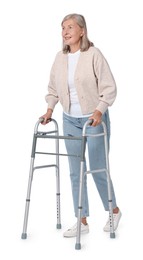 Photo of Senior woman using walking frame on white background