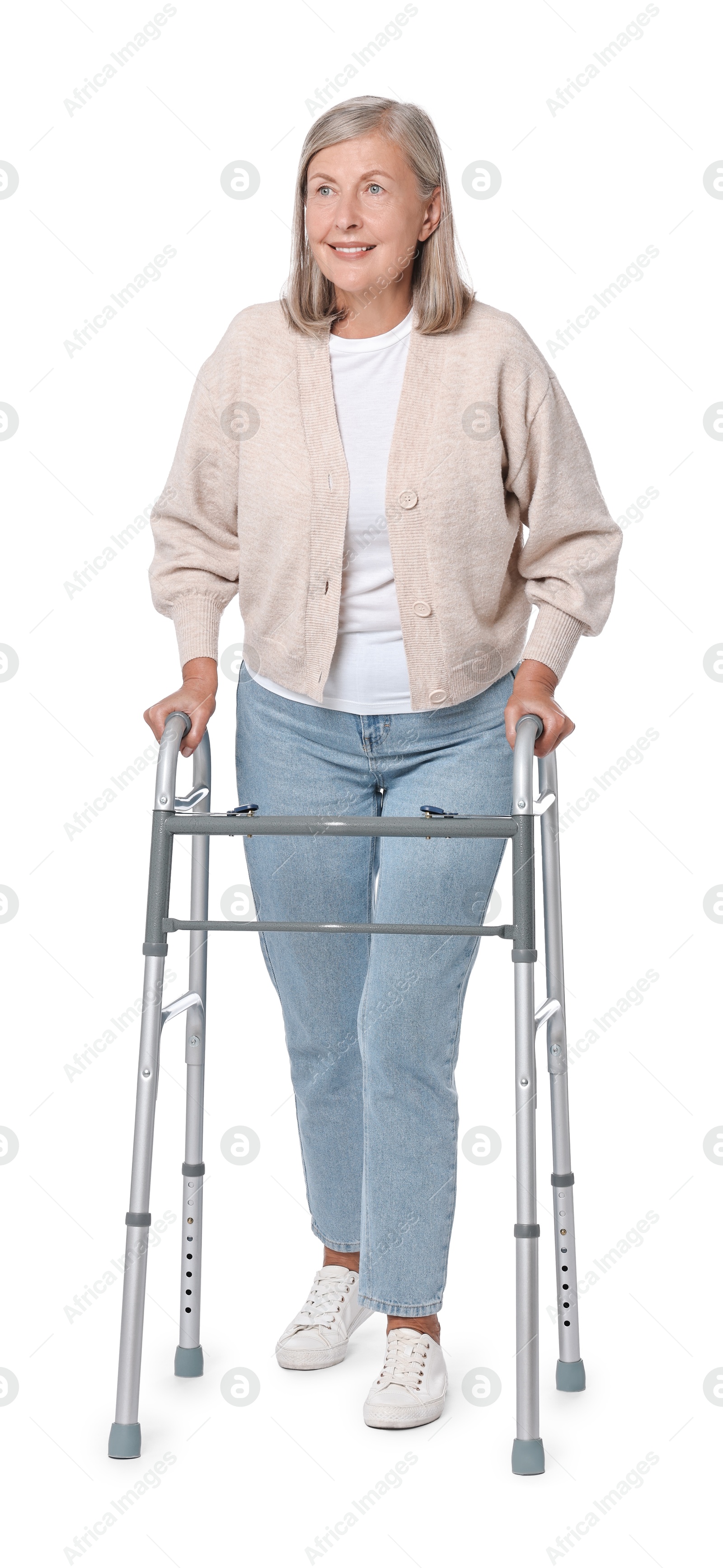 Photo of Senior woman using walking frame on white background