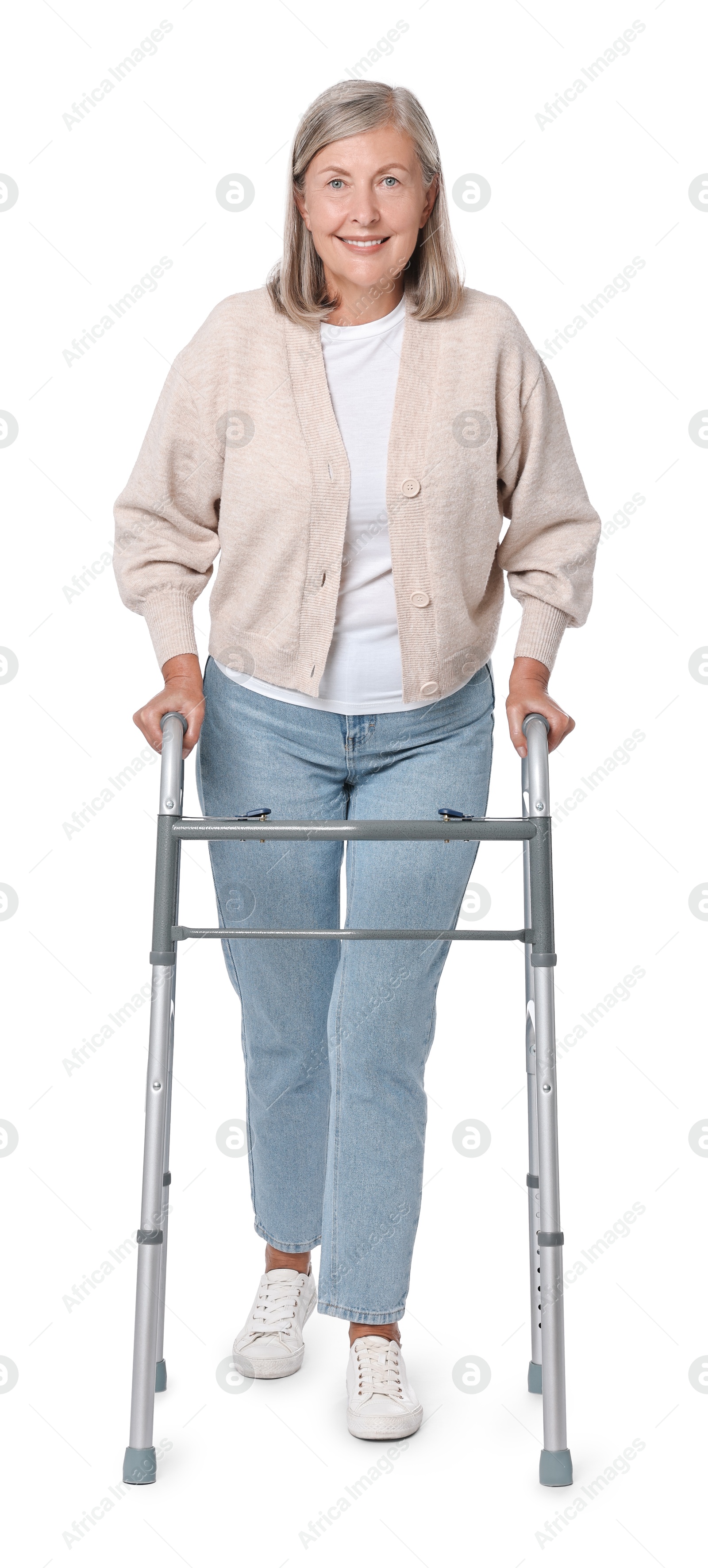 Photo of Senior woman using walking frame on white background