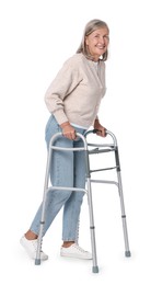 Photo of Senior woman using walking frame on white background