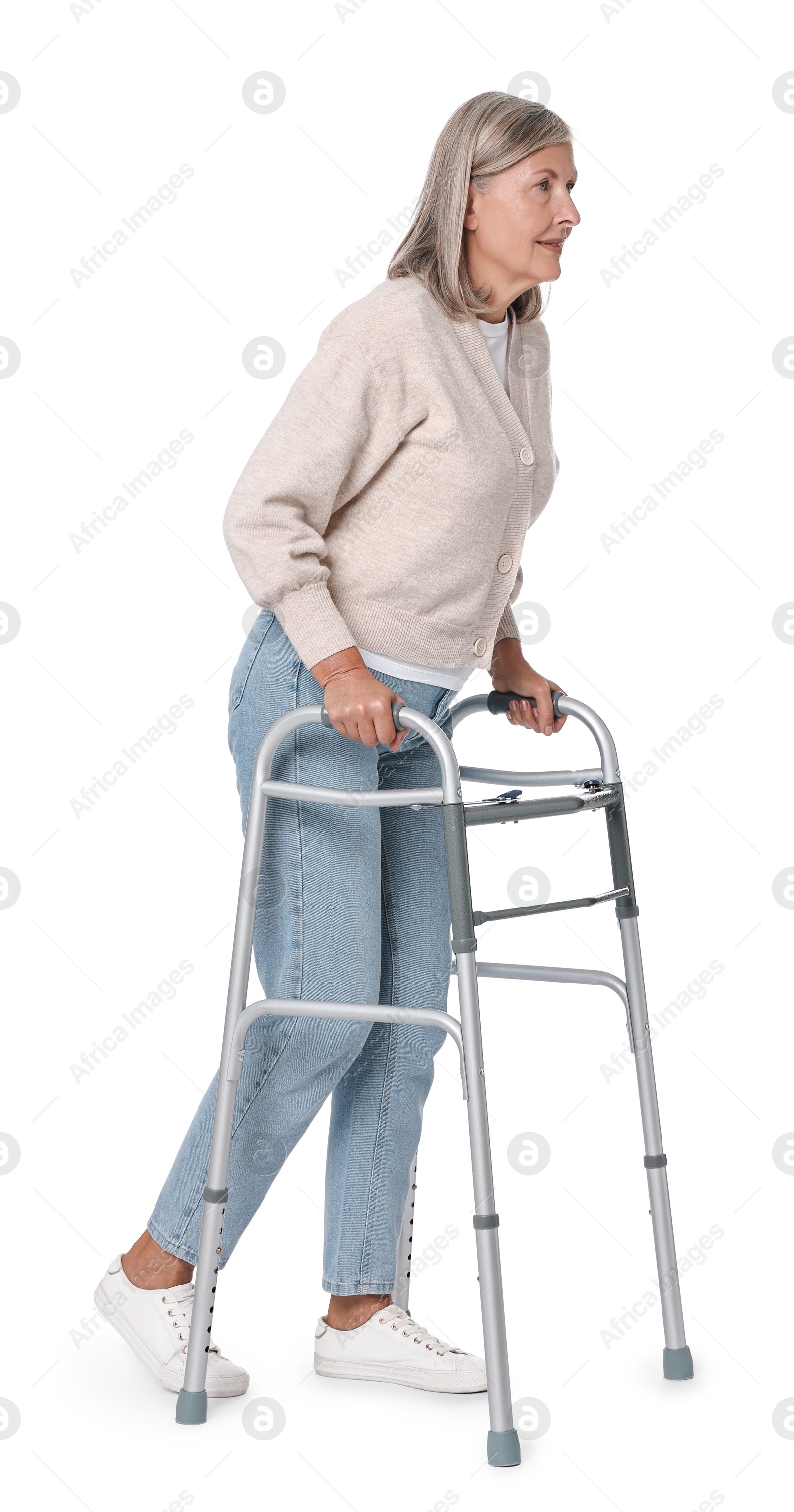 Photo of Senior woman using walking frame on white background