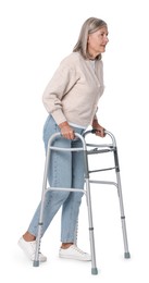 Photo of Senior woman using walking frame on white background