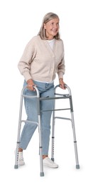 Senior woman using walking frame on white background