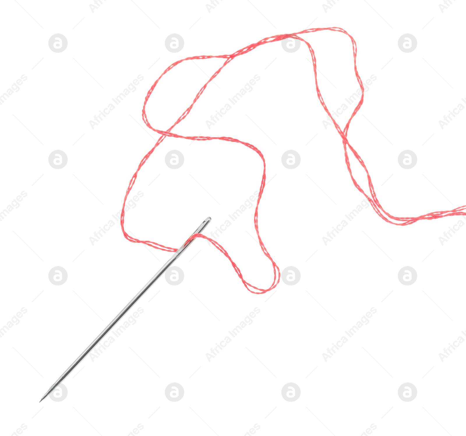 Photo of Sewing needle with red thread isolated on white