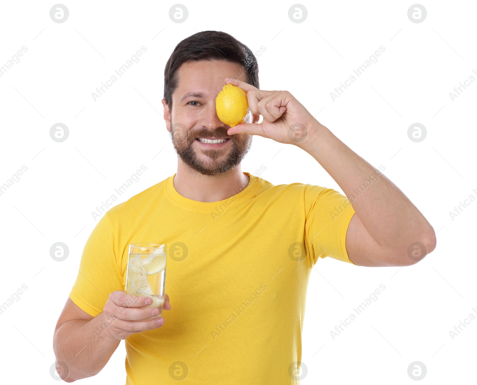 Photo of Happy man holding glass of water with lemon on white background