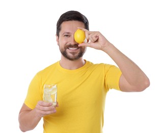 Photo of Happy man holding glass of water with lemon on white background