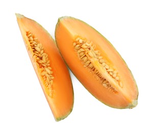 Photo of Pieces of Cantaloupe melon isolated on white, top view